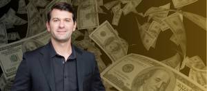 Man standing in front of a money background